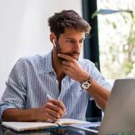 Person working on a laptop in the office
